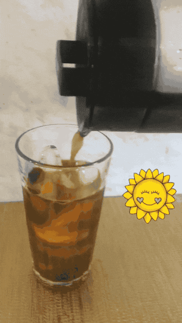 a gif of ice coffee being poured of a pitcher