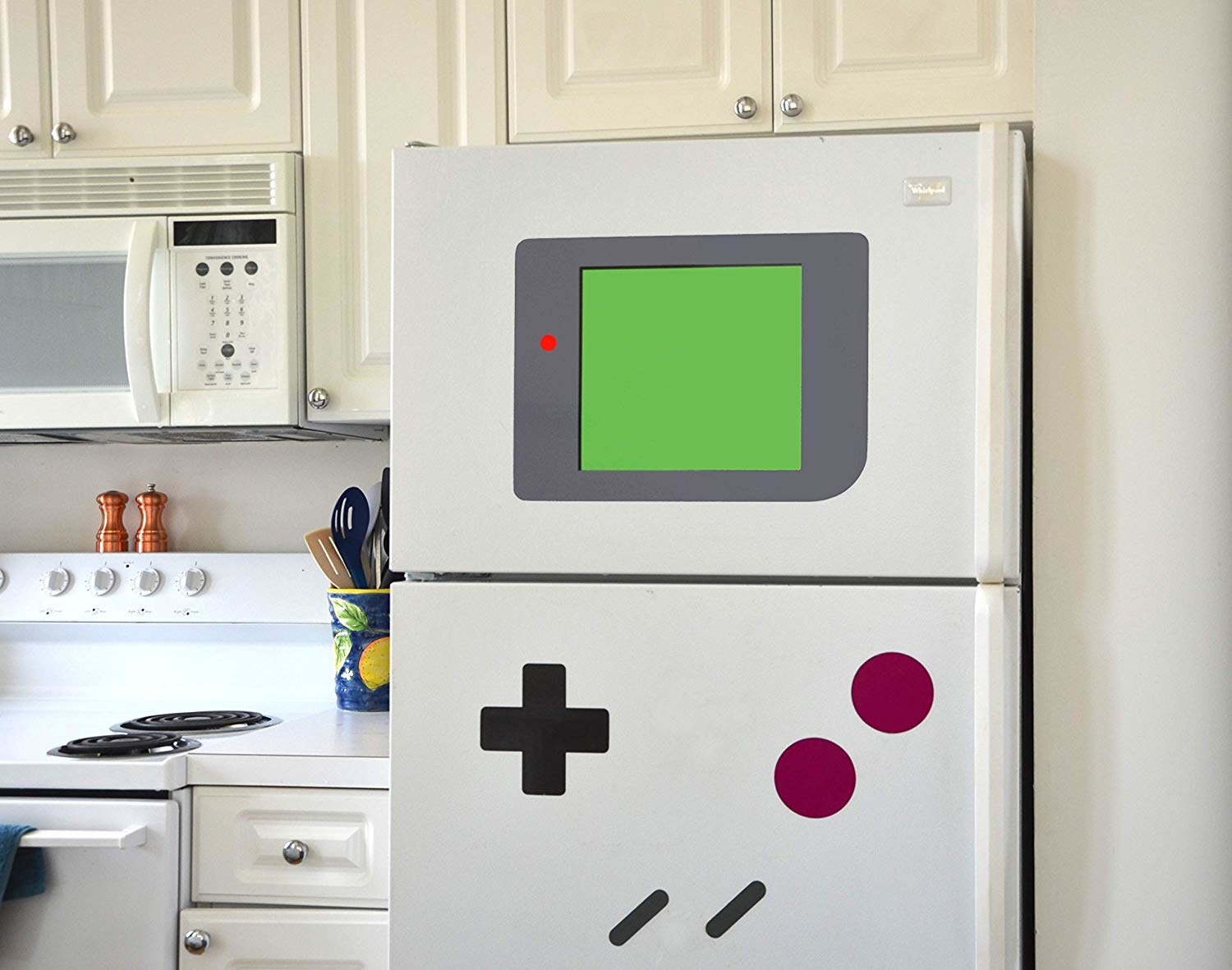 Refrigerator with old school Gameboy buttons and screen decals 