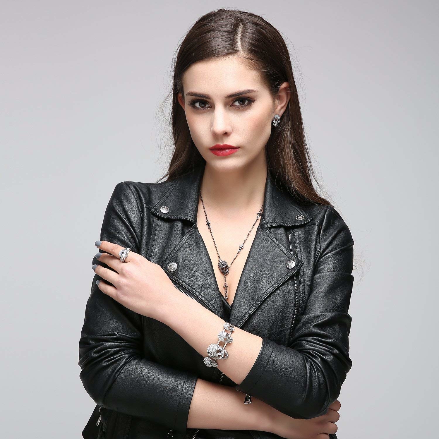 model wearing the skull necklace with a leather jacket