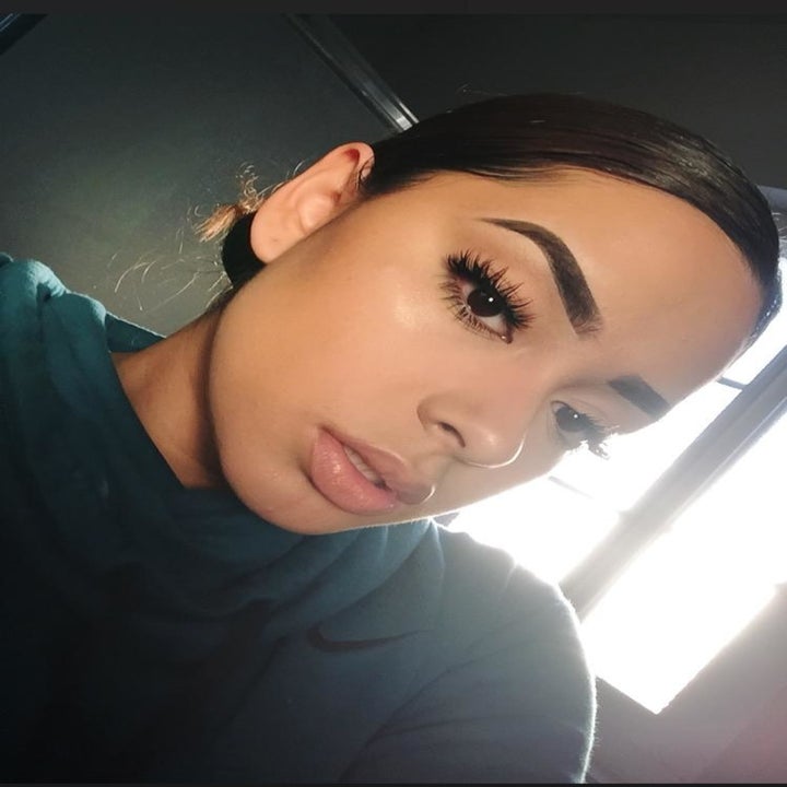 Reviewer photo showing application of face powder