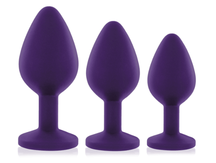 Three butt plugs organized from tallest to shortest. 