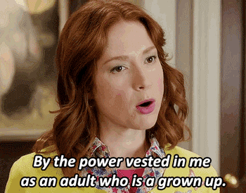 Gif of Kimmy from &quot;The Unbreakable Kimmy Schmidt&quot; saying &quot;By the power vested in me as an adult who is a grown up&quot;