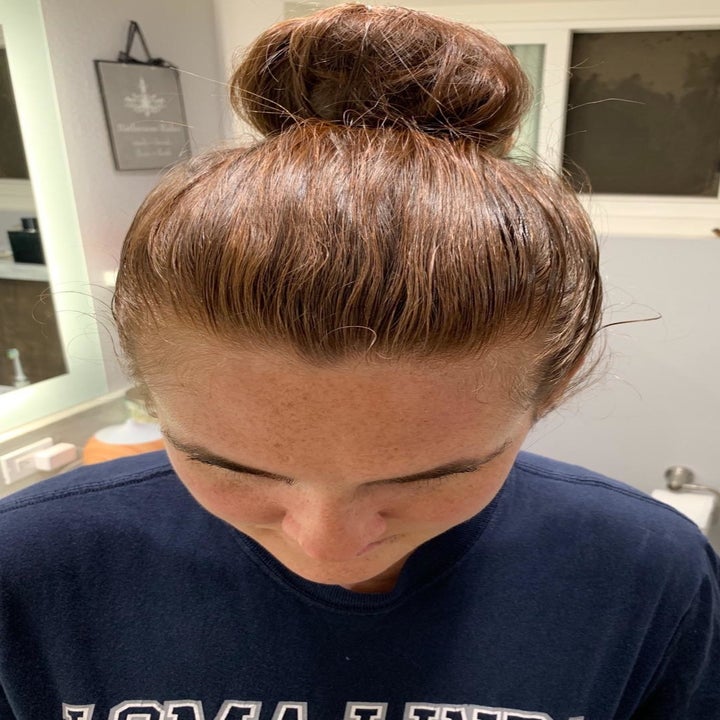 the same reviewer with a bun and no flyaways 