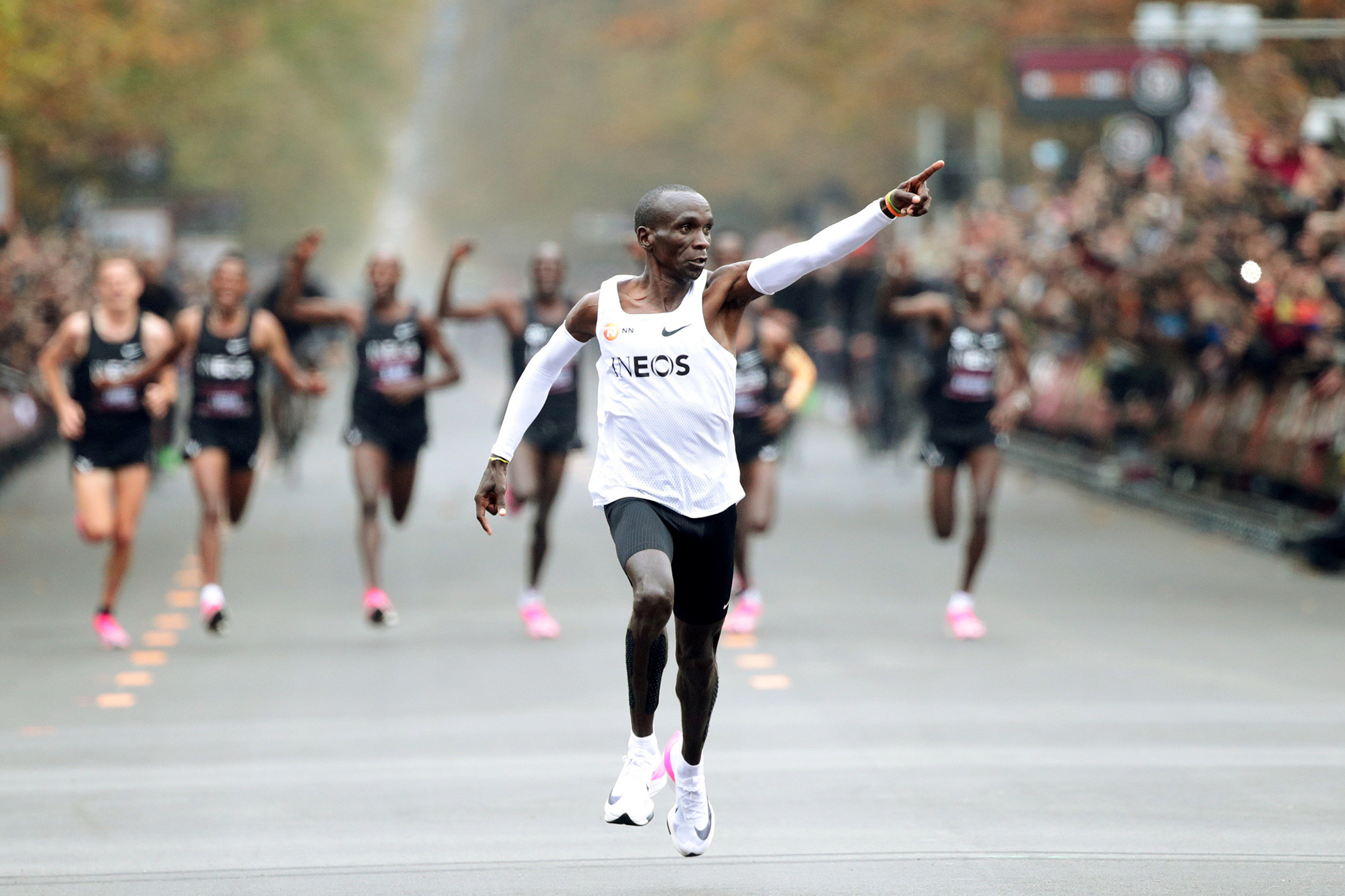 Kenya's Eliud Kipchoge, the marathon world record holder, crosses the finish...