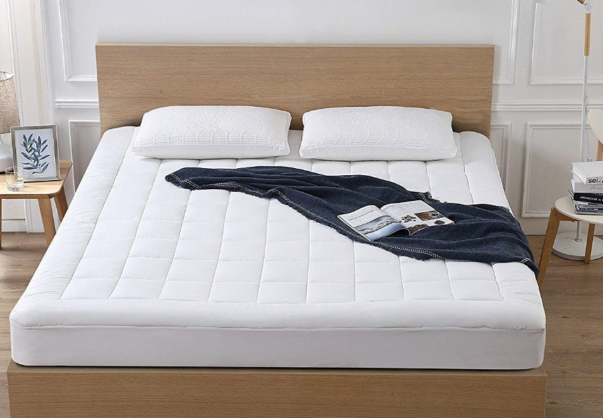 The mattress topper on a queen bed