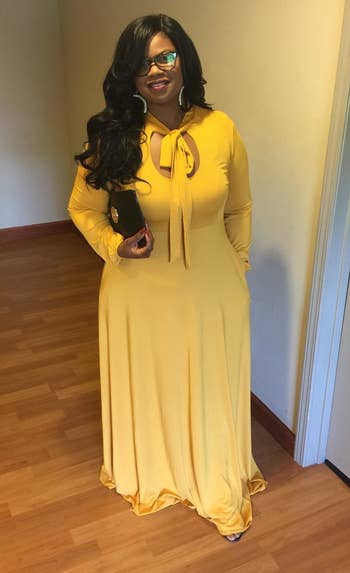Reviewer wearing the long-sleeved dress in yellow