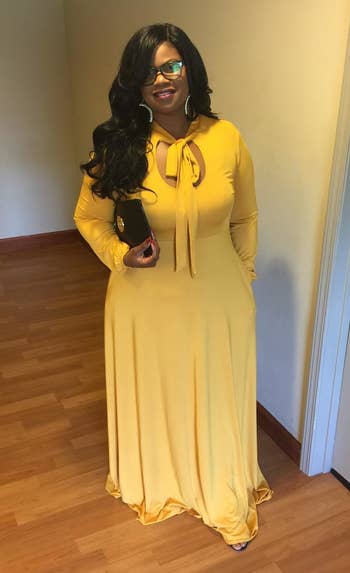 Reviewer wearing the long-sleeved dress in yellow