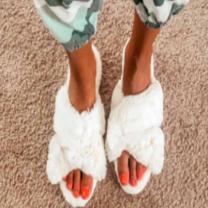 Reviewer wearing slippers in white
