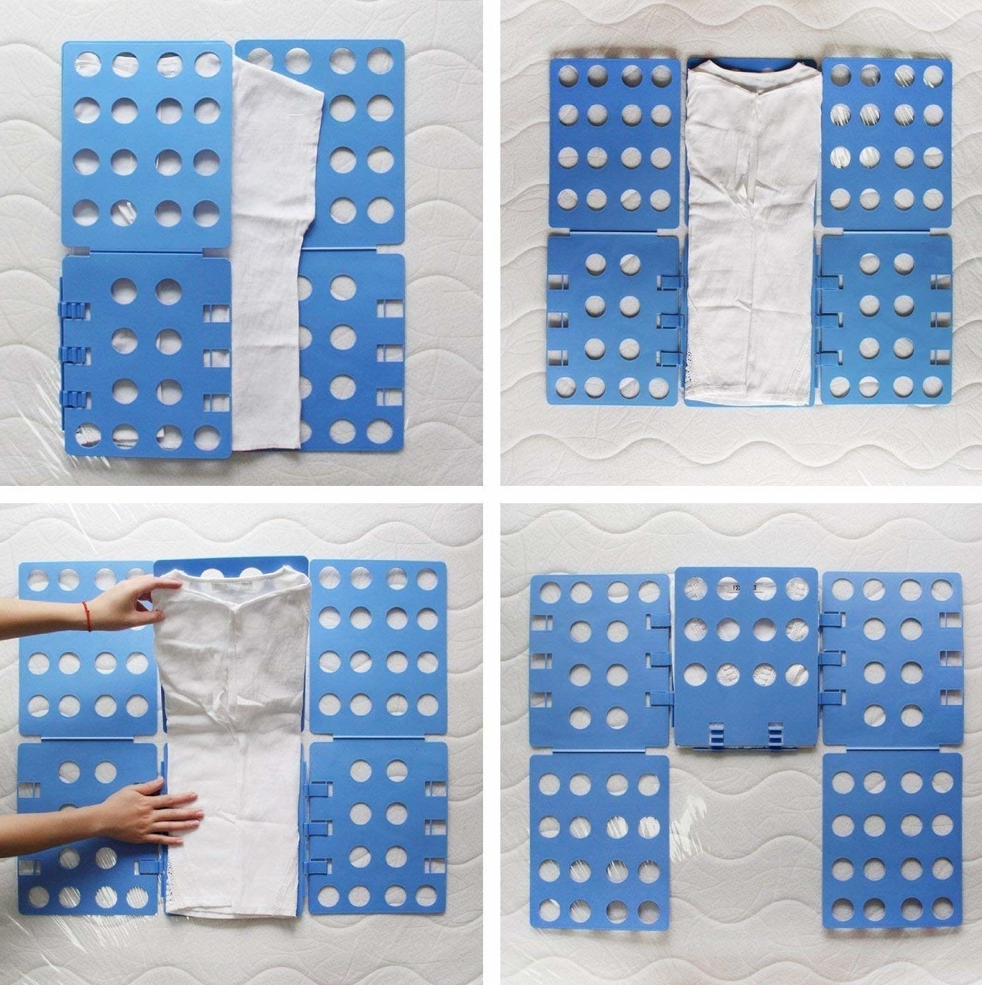 a white shirt being folded on a blue folder