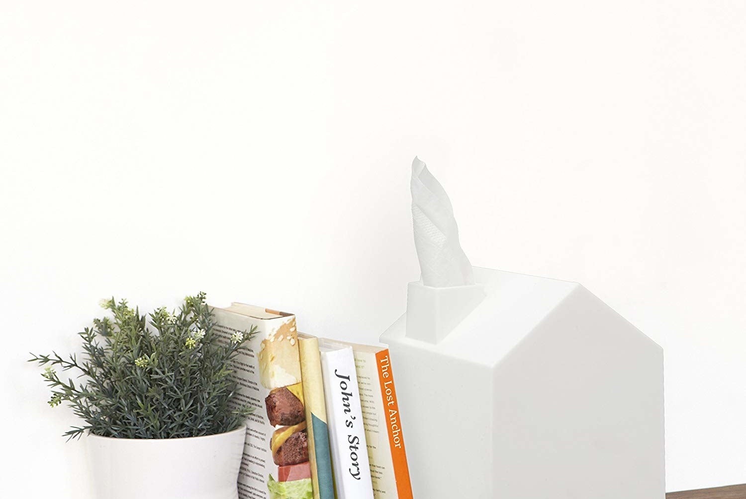 屋形纸巾盒的设计让组织看起来像烟的烟囱”class=