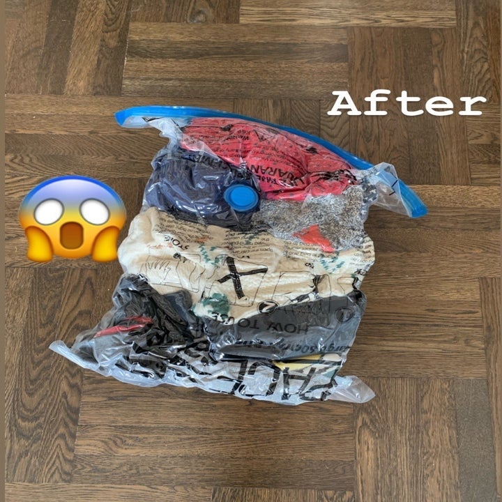 the same pile of clothes neatly vacuum packed in a storage bag