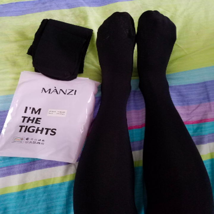 Reviewer wearing the tights in black. They are not sheer. 