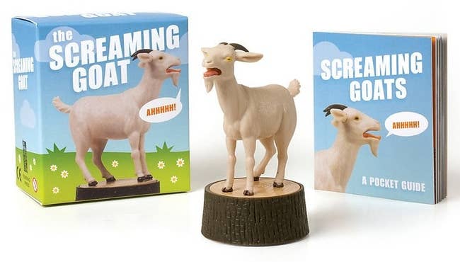 The goat figurine, plus the box it comes in and the booklet