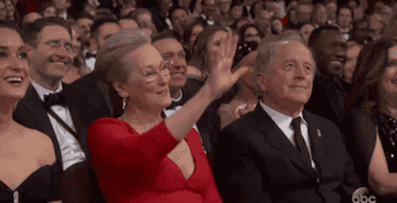 Gif of Meryl Streep waving her hand like it&#x27;s no big deal