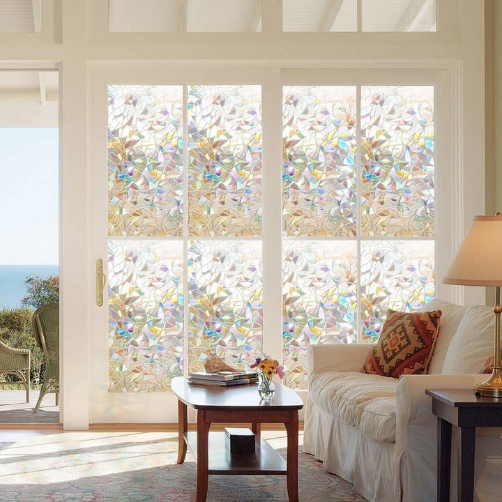 The decorative window film on a set of eight windows in a room