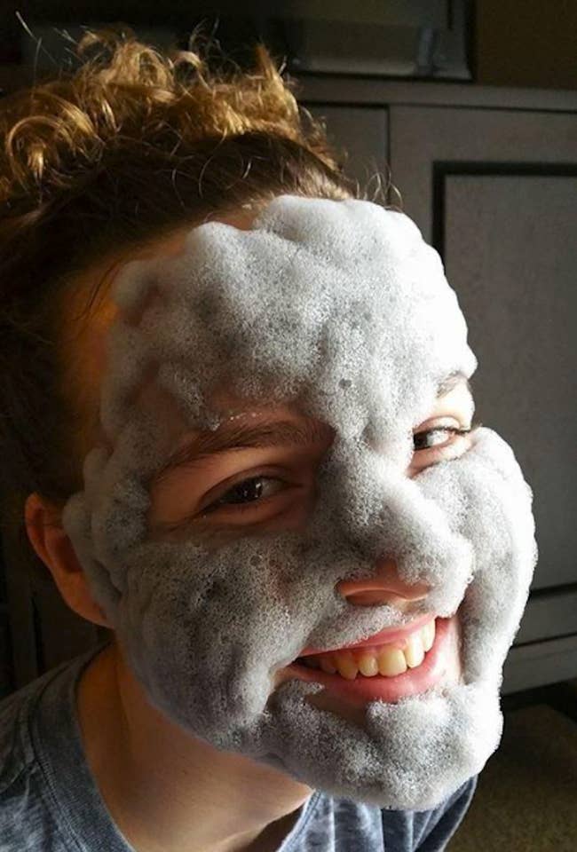 reviewer image of a customer's face covered in the foaming Elizavecca Milky Piggy Carbonated Bubble Clay Mask