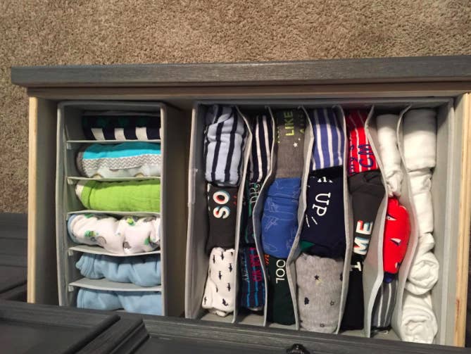 a reviewer&#x27;s photo of their drawer organized with the inserts