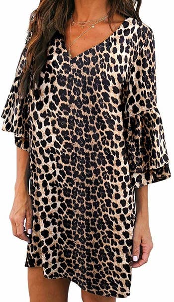 model wearing the dress in leopard print