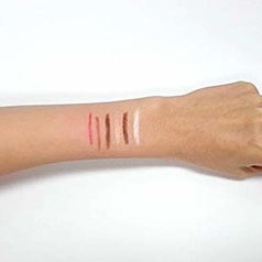 Arm with makeup swatches on it