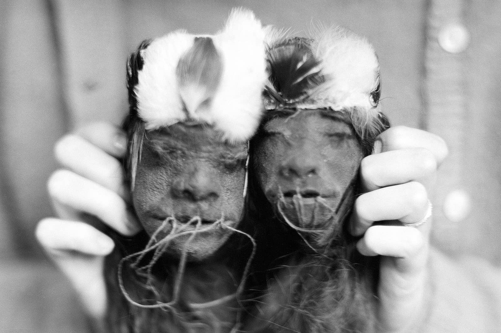 Two small severed heads