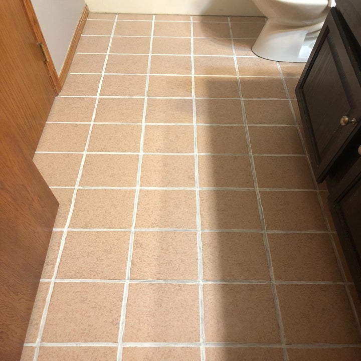 After photo of the same reviewer's floor with all of the grout painted white