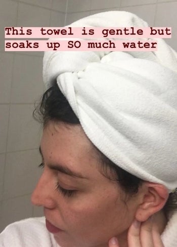 BuzzFeed editor Natalie Brown with the towel wrapped around her wet hair and the words 