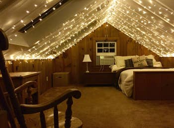 twinkle lights along the top of a bedroom ceiling