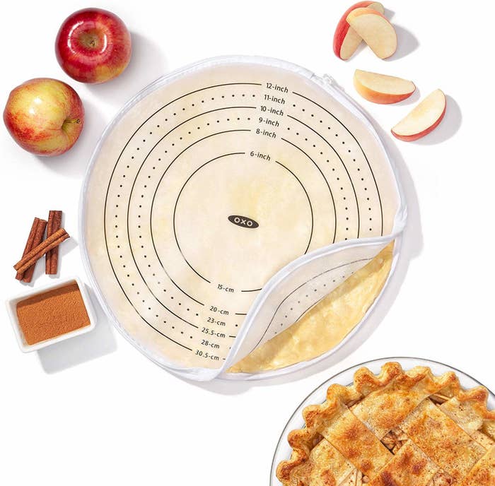 The round zipper pie bag with dough inside and measurements printed on it