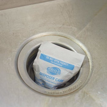 The packet sitting in a garbage disposal