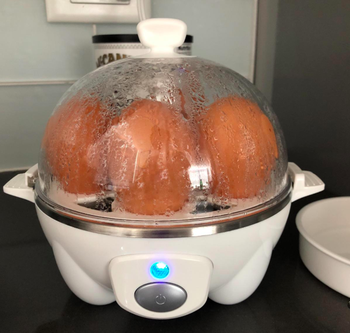 Reviewer photo o f rapid egg cooker with six eggs inside