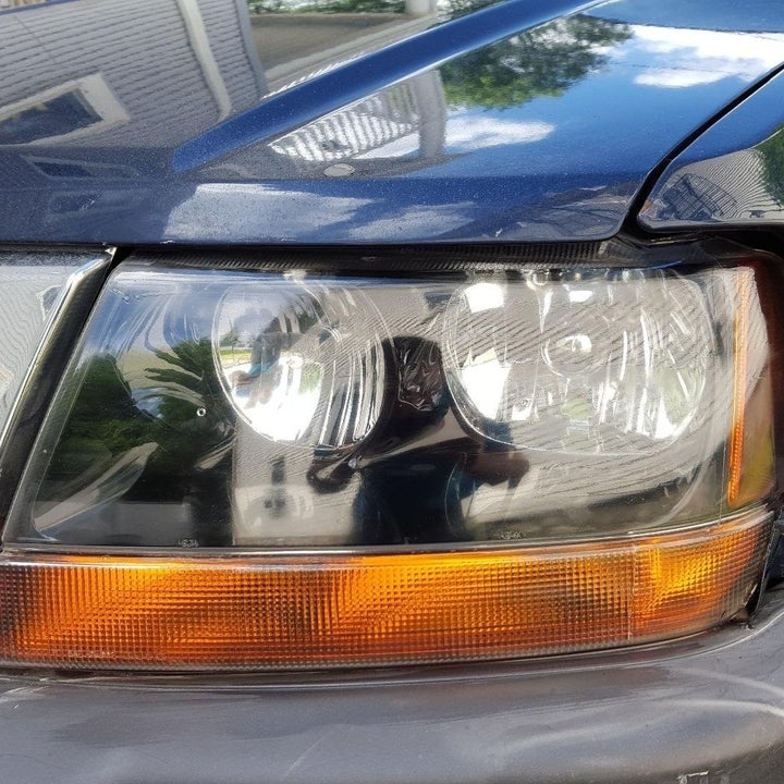 After photo of the same Jeep with headlights that look brand new