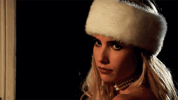 gif of emma roberts in the tv show scream queens shrugging and saying &quot;I guess we&#x27;ll see&quot;