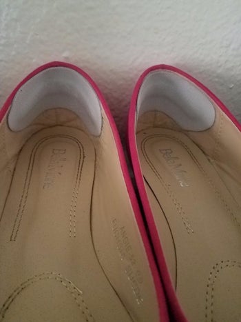 The heel grip stuck on the backs of a pair of shoes