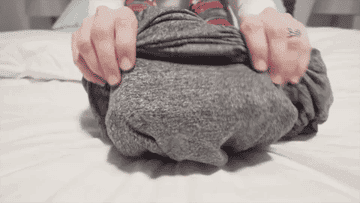 gif of model getting into the stretchy grey sleep pod