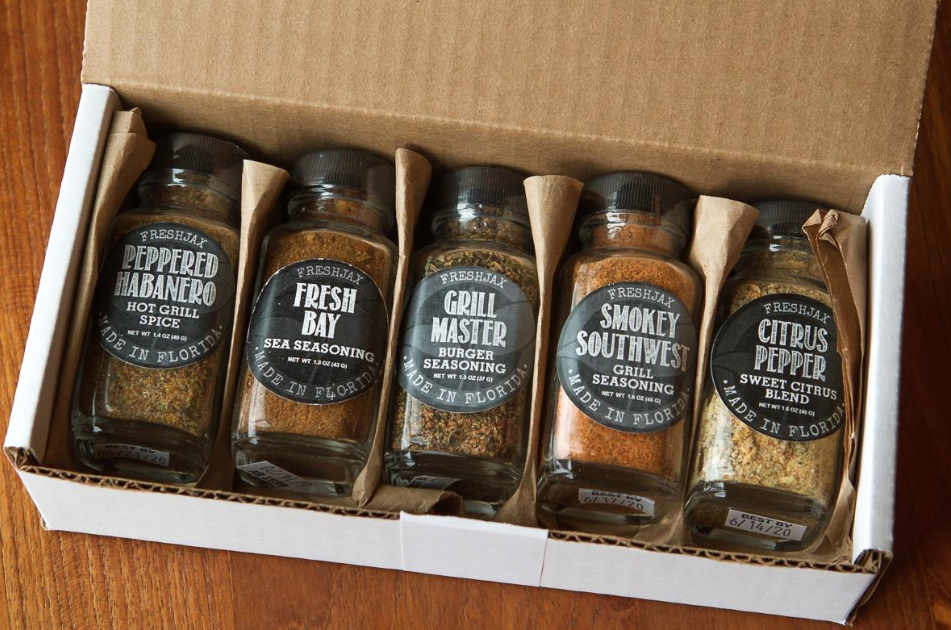 Reviewer image of the spice set opened up with five different spice flavors