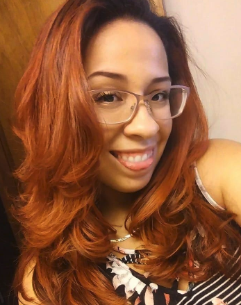 Reviewer photo with nicely blown out hair