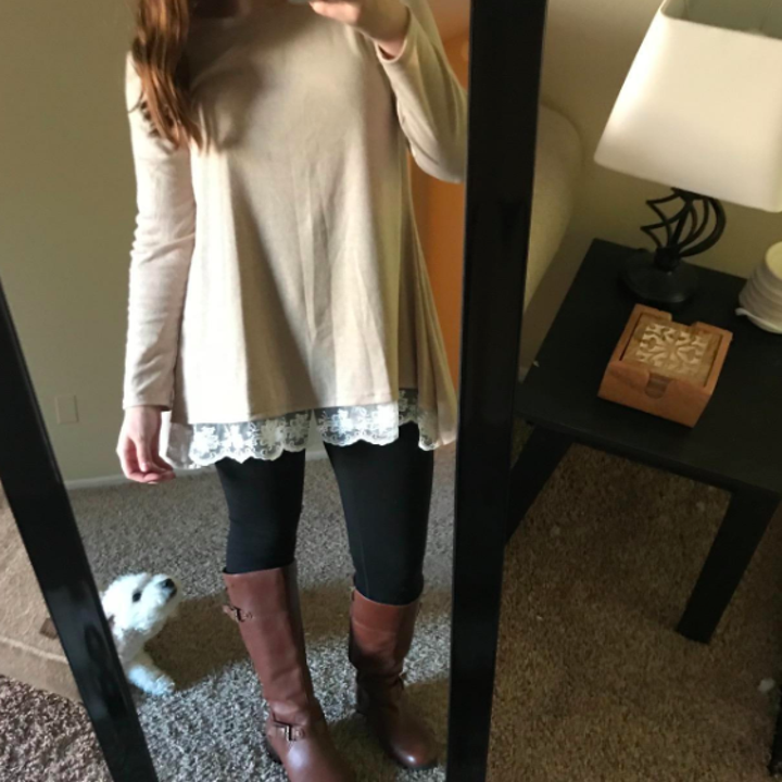 A reviewer wearing the shirt in khaki