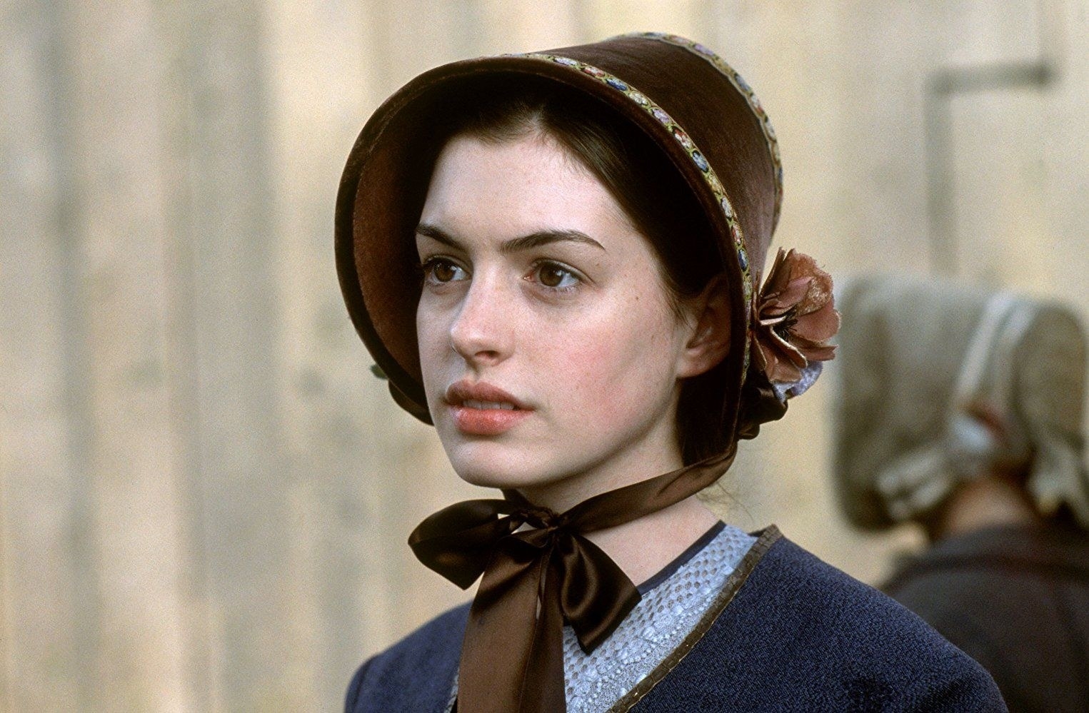 Anne Hathaway wearing a bonnet