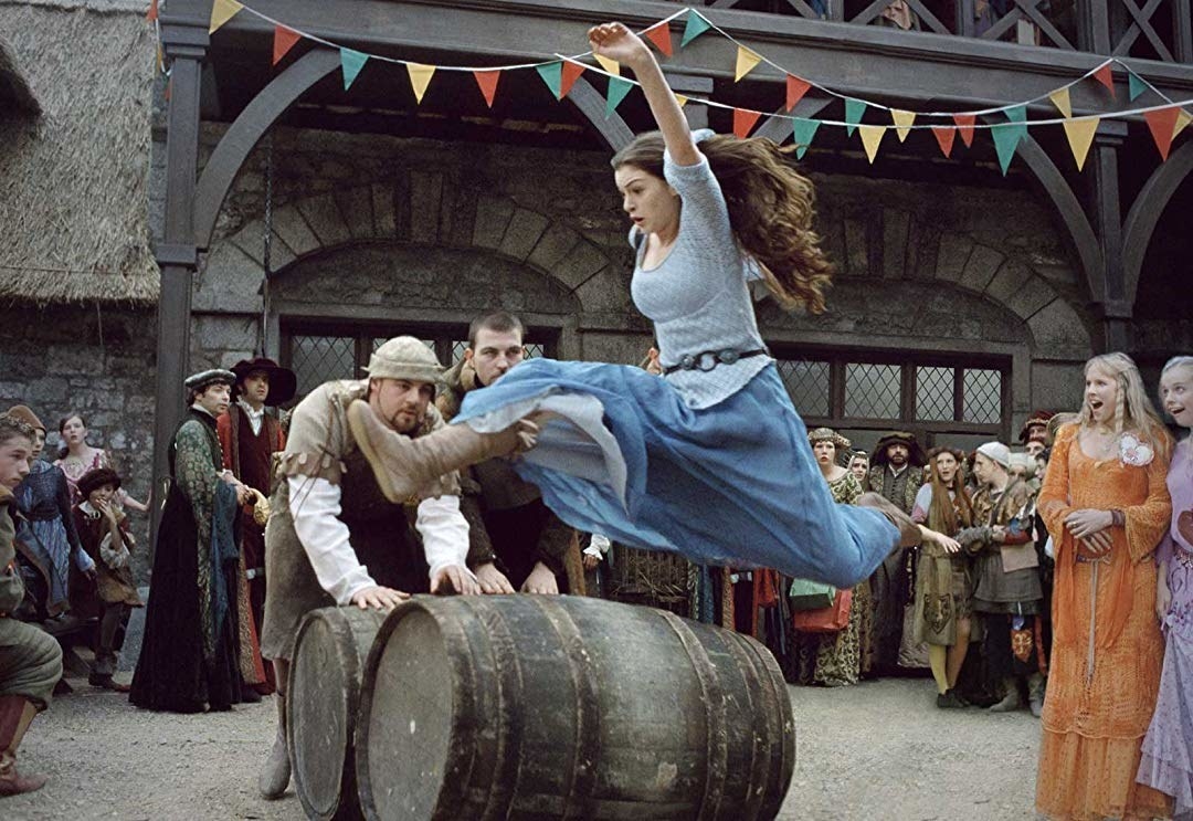 Anne Hathaway jumps over a barrell