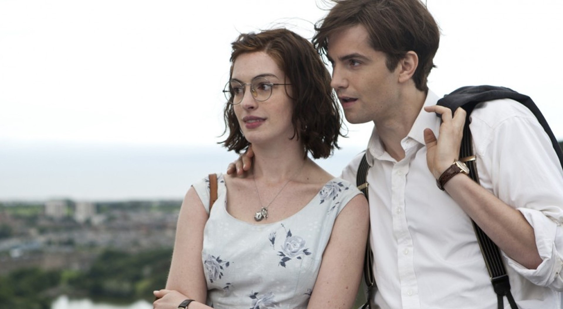 Anne Hathaway and Jim Sturgess look at the sunset