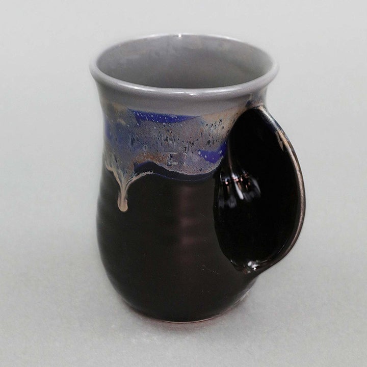 Hand-warming ceramic mug in grey/black colorway 
