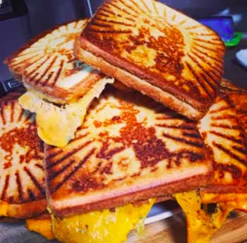 several grilled cheese sandwiches a reviewer made with the press 
