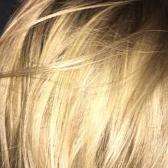 a reviewer's brassy blonde hair