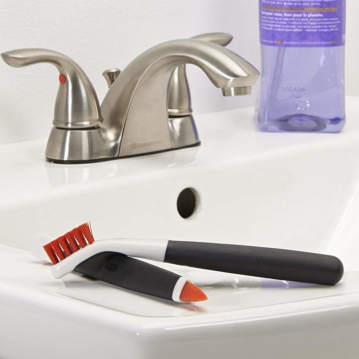 two deep clean brushes in red 