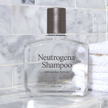 The clear shampoo bottle