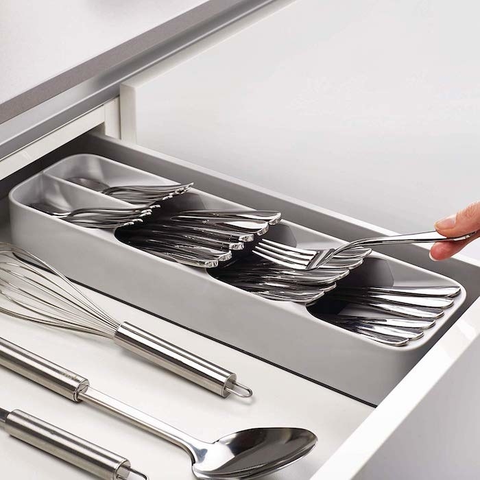 The tray, which has five angled compartments for silverware
