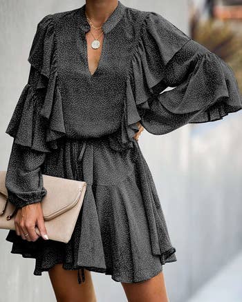 model wearing gray ruffle dress