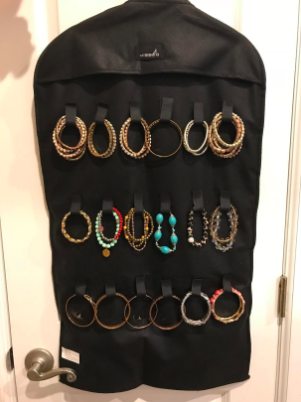the opposite side of the organize with loops for holding necklaces and bracelets without tangling