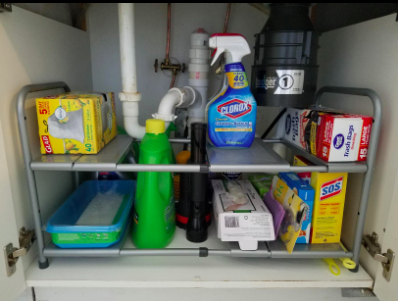 reviewer&#x27;s under sink adjustable organize with two shelves fitting around the pipe