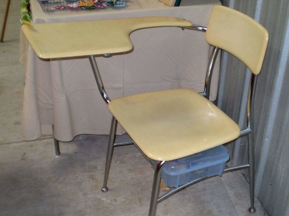 A school chair with attached desk